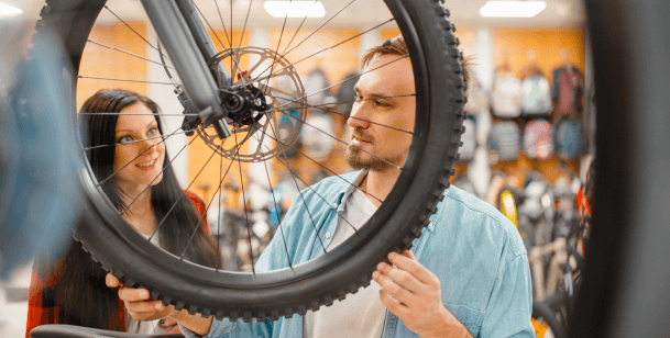 a man admiring a bike before a bike accident that sent him to the emergency room in Houston, TX