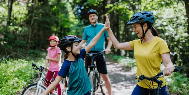 Family riding bicycles in Houston, TX